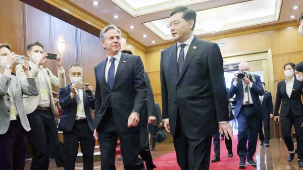 
US Secretary of State Antony Blinken walks with China's Foreign Minister Qin Gang at the Diaoyutai State Guesthouse in Beijing on Sunday. — courtesy Reuters