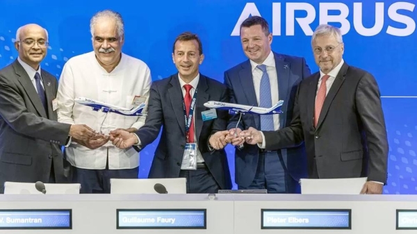 The co-founder of InterGlobe Aviation and the bosses of Airbus and IndiGo after signing the record order at the Paris Airshow. — courtesy Reuters