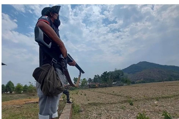 Armed men guard their village, some 27km from the Manipur state capital Imphal