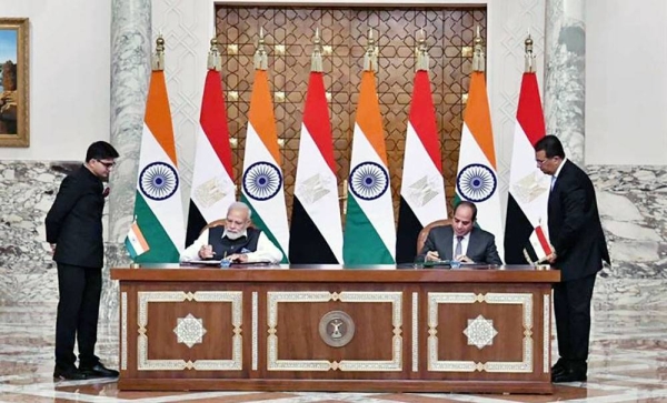 Egyptian President Abdel-Fattah El-Sisi and Indian Prime Minister Narendra Modi sign a joint declaration to raise the level of cooperation between the two countries to strategic partnership on Sunday. — courtesy of Egyptian Presidency