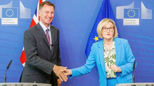 Chancellor Jeremy Hunt (L) and EU Commissioner for Financial Stability, Financial Services and Capital Markets Union Mairead McGuinness shake hands after signing the EU-UK Memorandum of Understanding on financial services regulatory cooperation. — courtesy EPA