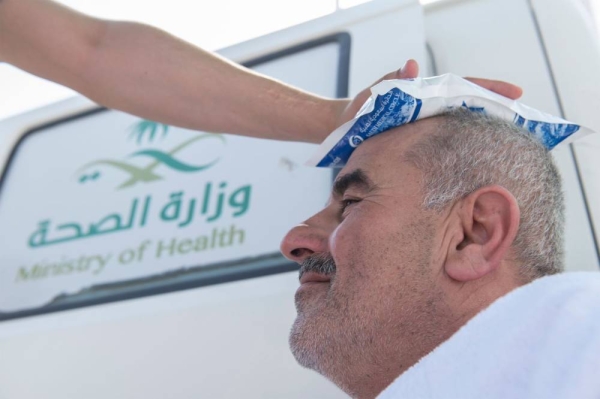 Hajj pilgrim being treated for heat exhaustion on Arafat Day in Hajj 2023
