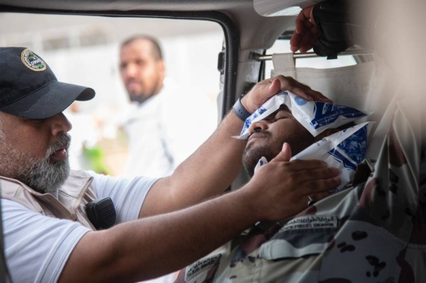 Hajj pilgrim being treated for heat exhaustion on Arafat Day in Hajj 2023