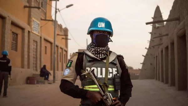 UN policemen on patrol in front on the Great Mosque in Timbuktu