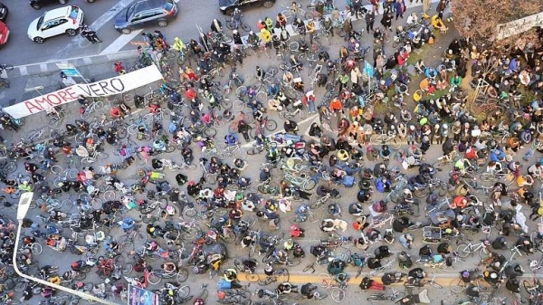 Cyclists gather to protest in Piazzale Loreto, a major city square in Milan.