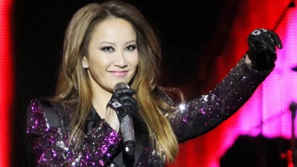 Coco Lee performs on stage during Booey Lehoo Concert at National Indoor Stadium on December 17, 2011 in Beijing.