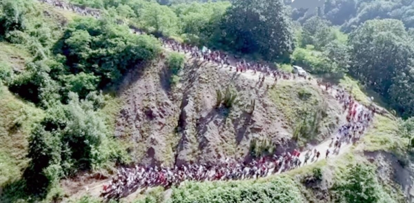 Screenshots of Bosnia Srebrenica Anniversary march shows participants in the annual peace march to remember the victims of the 1995 Srebrenica genocide.