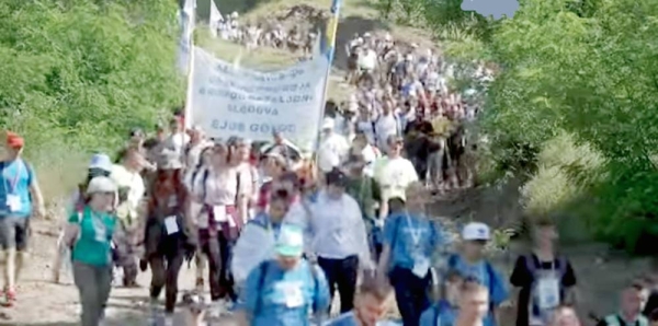 Screenshots of Bosnia Srebrenica Anniversary march shows participants in the annual peace march to remember the victims of the 1995 Srebrenica genocide.