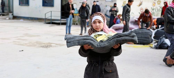 The World Food Program distributes RTE (ready-to-eat) and non-food to families affected by the earthquake in the Al Mashariqa neighbourhood of Aleppo, Syria. — courtesy WFP/Hussam Al Saleh