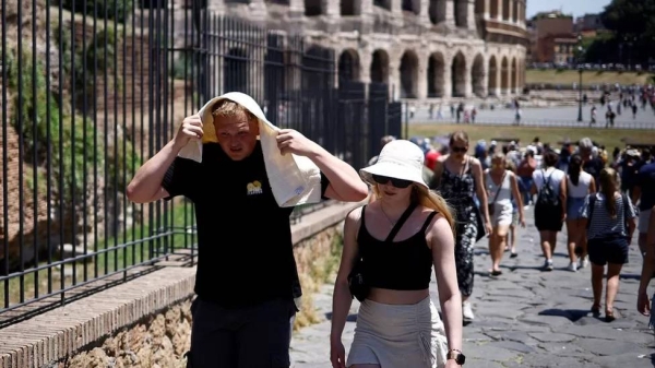 A man sheltering from the sun during a heatwave in Rome, Italy on Tuesday.