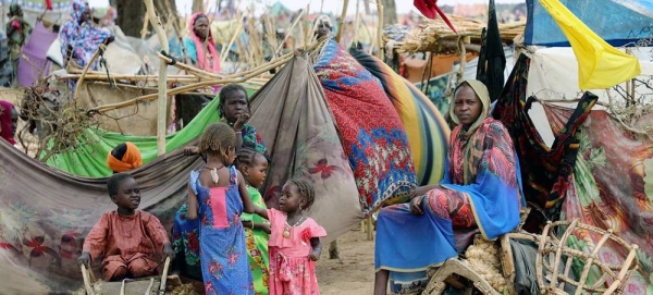 People seek shelter at a refugee entry point located 5 km from the Chadian border with Sudan. Most of these people were already internally displaced in the Darfur region. — courtesy WFP/Eloge Mbaihondoum