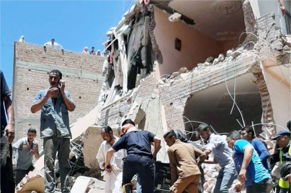 The scene of a collapsed 8-story building in the Rashid district in the Egyptian Nile Delta governorate's Beheira on Sunday. — courtesy Al-Ahram