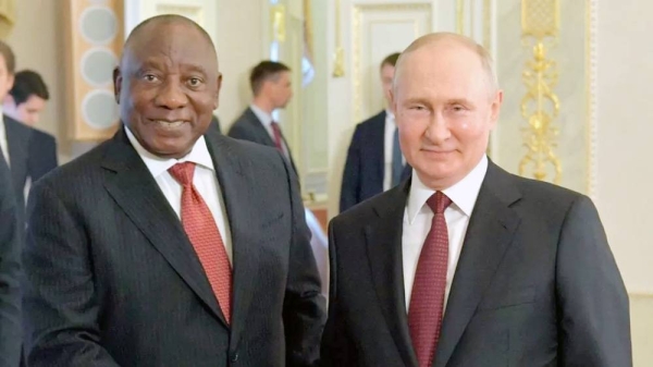 Russian President Vladimir Putin shakes hands with South African President Cyril Ramaphosa. — courtesy Reuters