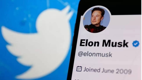 Twitter logo with Musk. — Courtesy Getty Images