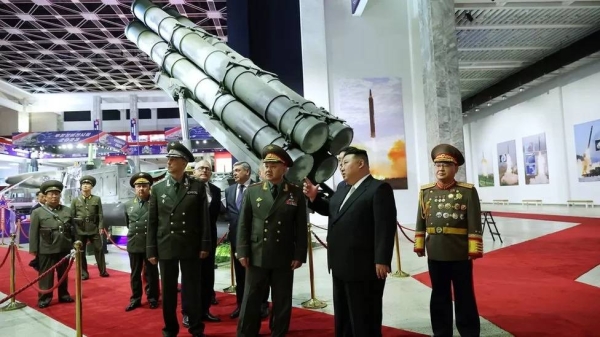 North Korean leader Kim Jong Un and Russia's Defense Minister Sergei Shoigu visit an exhibition of armed equipment on the occasion of the 70th anniversary of the Korean War armistice.