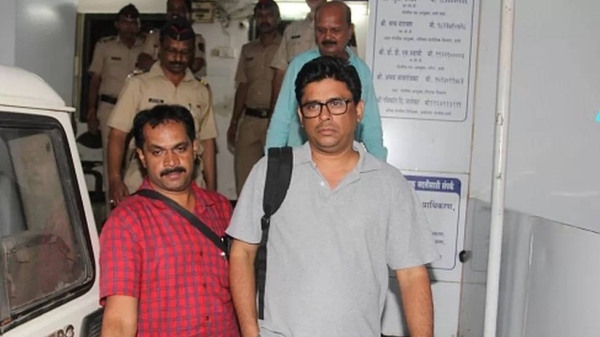 Arun Ferreira (in grey) was arrested by the police in August 2018