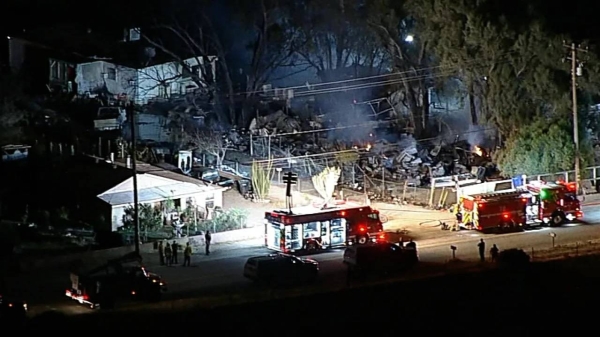 First responders at the scene of a helicopter crash in Riverside County, California, on Sunday.