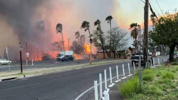 Firefighters are still battling active fires, with helicopters dropping water on the blazes from above