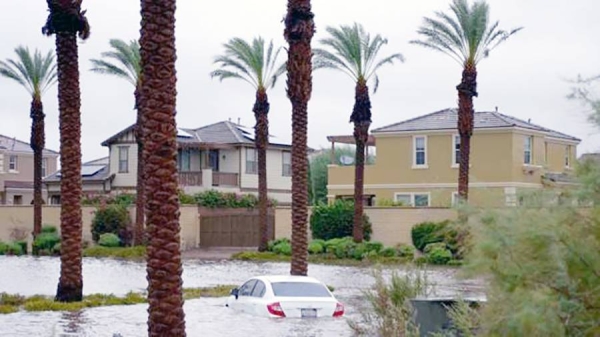 A car submerged in floodwater in Cathedral City, California. — courtesy Shutterstock