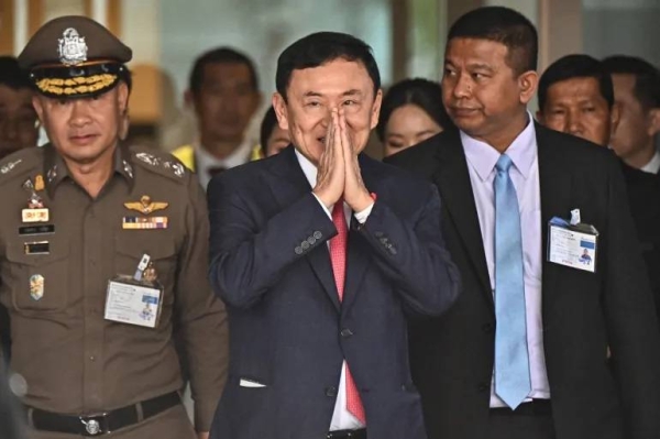 Thaksin was taken away by police after landing at Bangkok's Don Mueang Airport