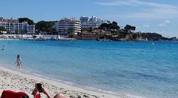 People enjoy the sunny weather on the Balearic island of Mallorca.