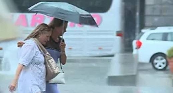 People in Genoa on Sunday morning were caught off-guard by the heavy rainfall