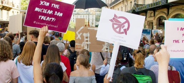 People protest against nuclear weapons at a worldwide climate strike in Geneva. (file). — courtesy ICAN/Lucero Oyarzun