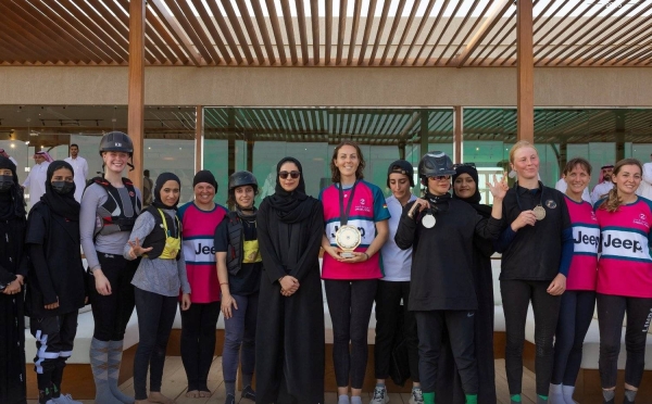 Saudi Assistant Minister of Sports for Sports Affairs Adwa Al-Araifi is with winners of first open international marathon for women in Taif.