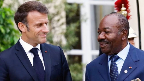 French President Emmanuel Macron (L) greets Gabon’s President Ali Bongo Odimba at the Élysée Palace in Paris, June 22, 2023. — courtesy Getty Images