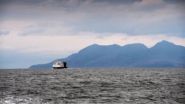 People travel by Caledonian MacBrayne ferry from Mallaig in the Scottish Highlands