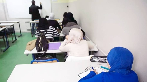 Students are pictured in their classroom at the La Reussite Muslim school on Sept. 19, 2013 in Aubervilliers. — courtesy AFP