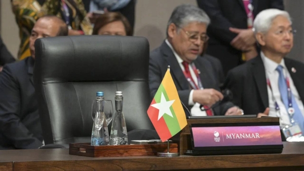 The seat reserved for the leader of Myanmar is left empty during the Association of Southeast Asian Nations (ASEAN) Summit in Jakarta, Indonesia, on September 6.