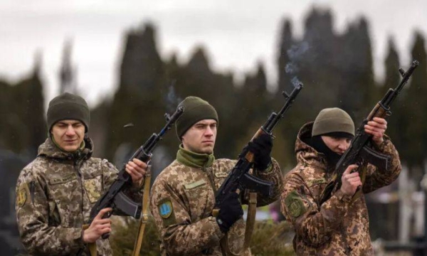 Ukrainian soldiers fire salvoes during a funeral in Bila Tserkva, near Kyiv