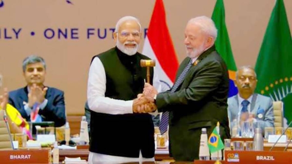 India Prime Minister Narendra Modi passes the gavel to Brazil’s Lula da Silva as G20 Summit concludes at the Bharat Mandapam on Sunday.