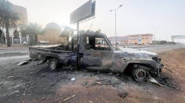 A burned vehicle is seen in Khartoum, Sudan, in this file photo. — courtesy Reuters
