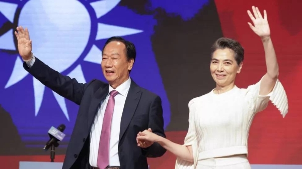 Many were surprised by Terry Gou's pick, actress Tammy Lai (R)