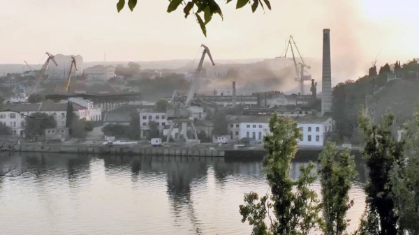 Smoke rises from a shipyard in the Russian-held Crimean port of Sevastopol. — courtesy Reuters