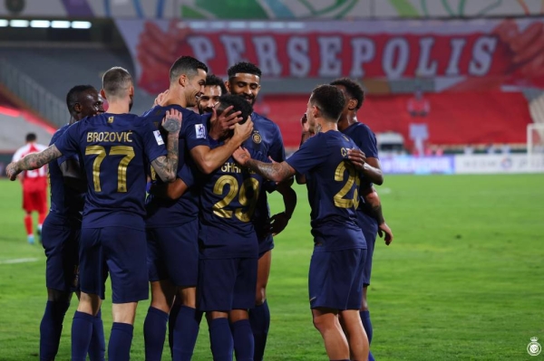 Al-Nassr football team, featuring Cristiano Ronaldo, marked its return to the AFC Champions League after a hiatus by securing a crucial 2-0 victory against Persepolis, the Iranian hosts. 