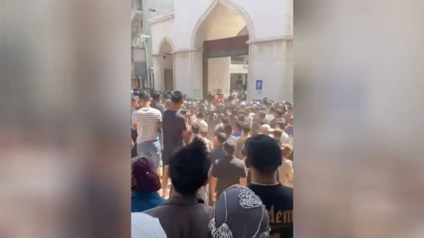 Residents belonging to China's Hui ethnic minority faced off with authorities in June in an attempt to defend their mosque, according to online videos and a witness who spoke with CNN.