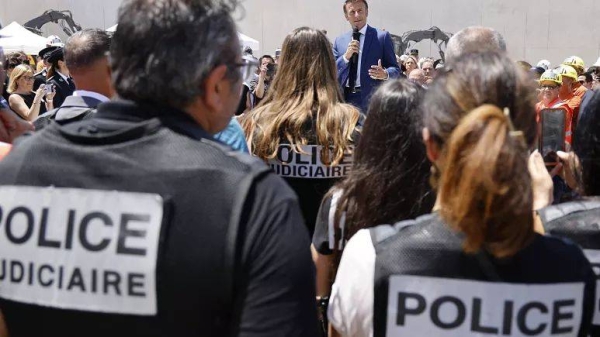 French President Emmanuel Macron speaks...during a visit at the construction site of the Baumettes 3 prison building in Marseille, France, Monday, June 26, 2023. -