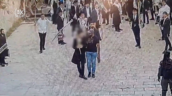 Israeli Police released a video on Wednesday that it says documents spitting incidents at church entrances in the Old City of Jerusalem. Faces have been blurred by Israeli Police in the video provided