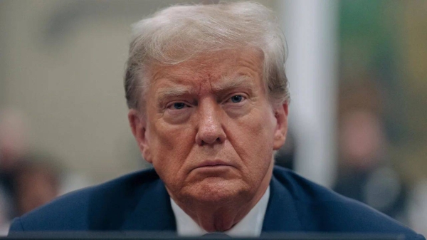 Former President Donald Trump listens during his civil fraud trial at the State Supreme Court building in New York on October 4, 2023