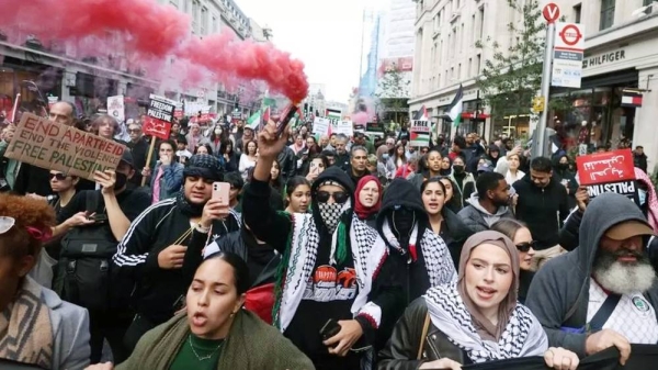 Some protesters set off green or red flares, with police warning “action will be taken” if they are identified. — courtesy EPA