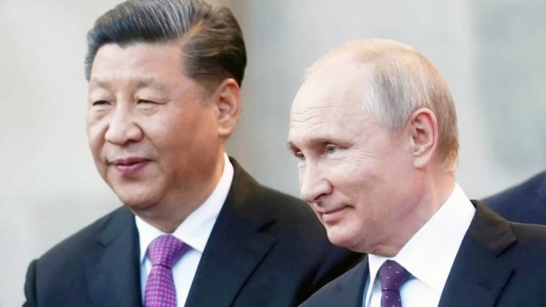 2019 photo of Xi Jinping and Vladimir Putin in Moscow. — courtesy Reuters