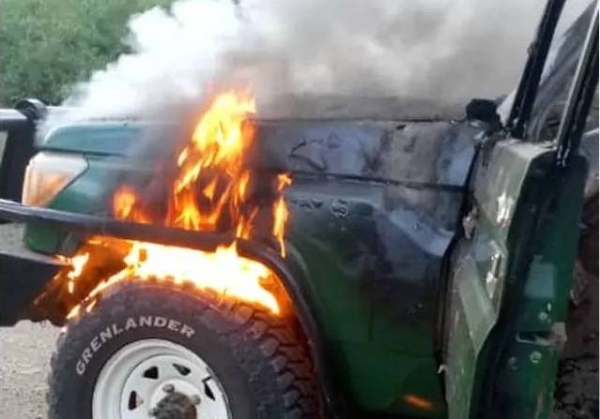 Four wheel drive car on fireImage source, Uganda Police Force