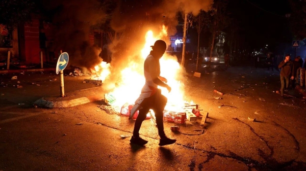 People protest against Israel in Ramallah, the West Bank, on October 17