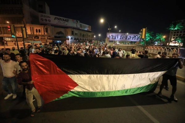 People protest against Israel in Ramallah, the West Bank, on October 17