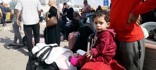 Families flee their homes in Rafah at the southern end of the Gaza Strip. — courtesy UNICEF/Eyad El Baba