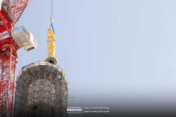 There are a total of 13 minarets for the Grand Mosque, and each minaret is topped with a golden crescent.