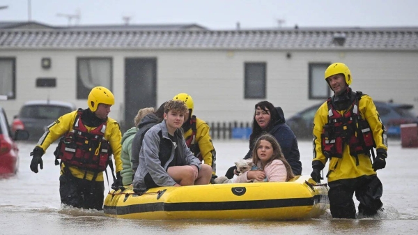 People are rescued from their holiday chalets at the Freshwater Beach Holiday Park in Burton Bradstock, Dorset, England, on , on November 02, 2023